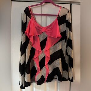 Daytrip sweater. Size large. Black and tan with a neon pink bow in the back.